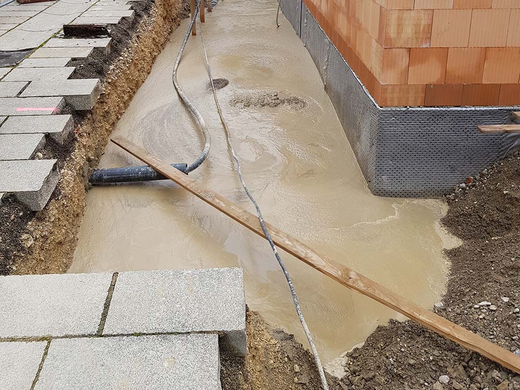 Arbeitsraumverfüllung mit Naturafix Bodenmörtel 0/10
